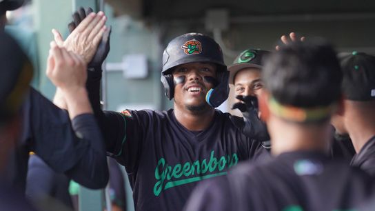 Valdez breaking out for high Class A Greensboro taken in Greenville, S.C. (Top story). Photo by GREG MACAFEE / DKPS